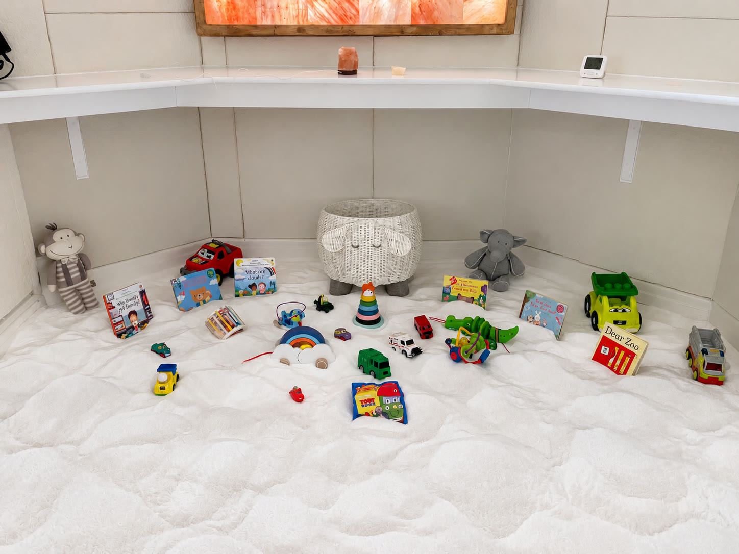 The play corner from the doorway: toys spread across the salt