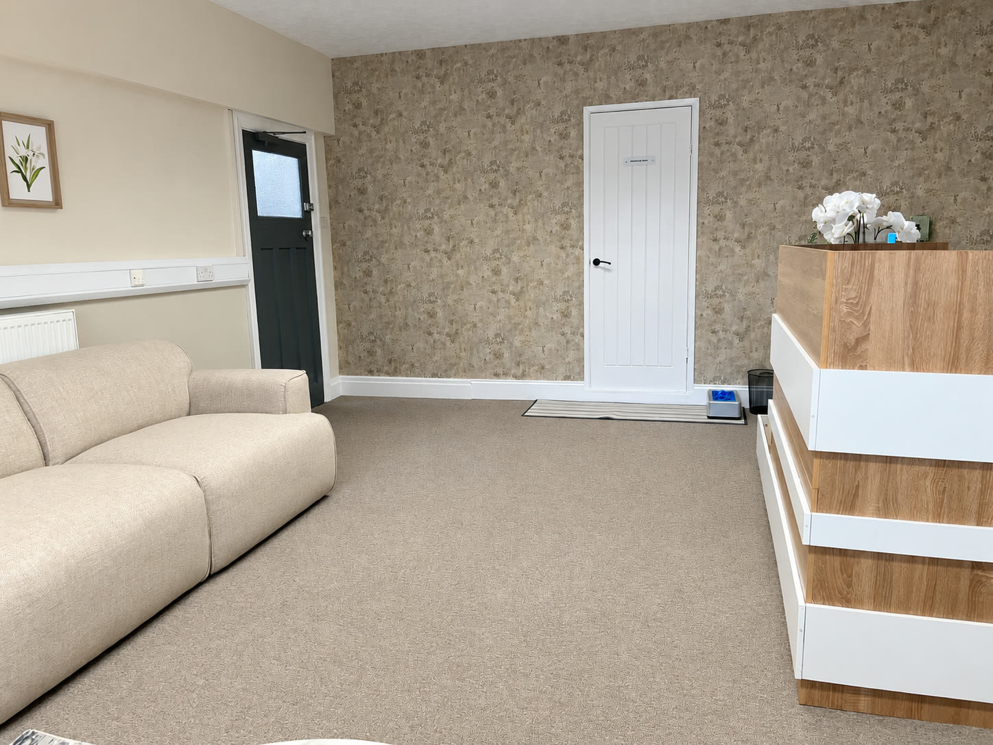 The reception desk from the sofa side