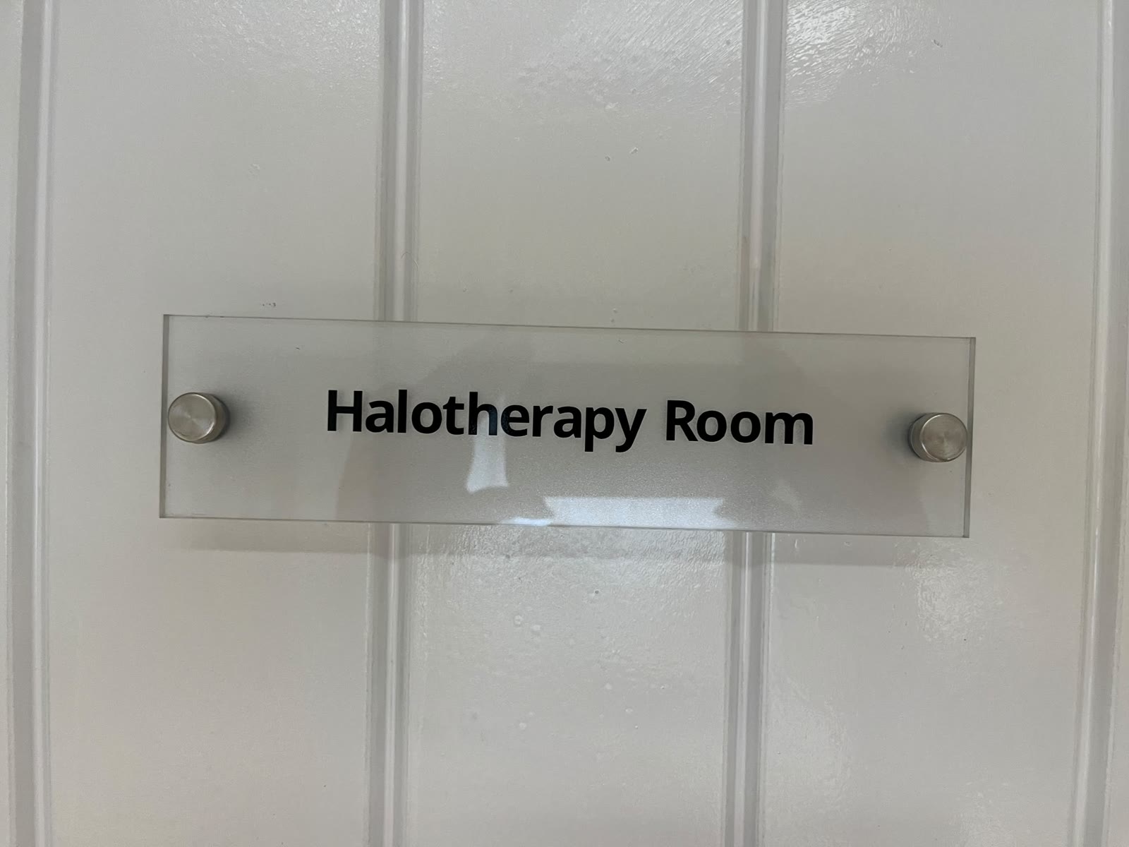The Halotherapy Room sign on the door to the salt room